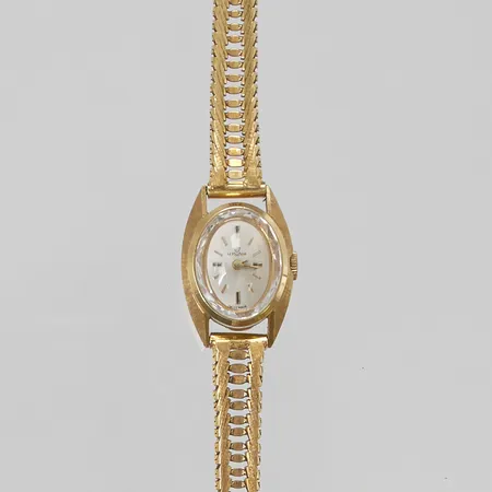 Damur Lemania 18K, 17x24mm, manuell, delvis satinerad, länk i 18K, totallängd ca 16/16,5cm, bruttovikt 27,1g.