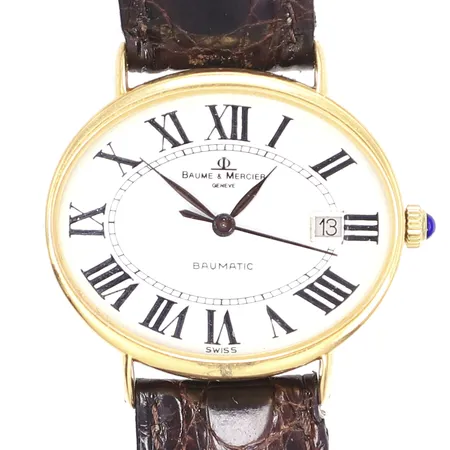Armbandsur Baume & Mercier Baumatic, Ø31mm, automat, datum, boettnummer 420498, 3706, 18K i boett, med slitet läderband ej original, något repig boett, boettnummer något bortpolerade