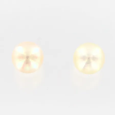 Ett par örhängen med odlade pärlor Ø4mm, stoppar saknas, 18K  Vikt: 0,4 g
