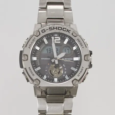 Herrur Casio G-Shock Tough Solar ref:GST-B300 stål quartz 49mm, repor på boett och länk.