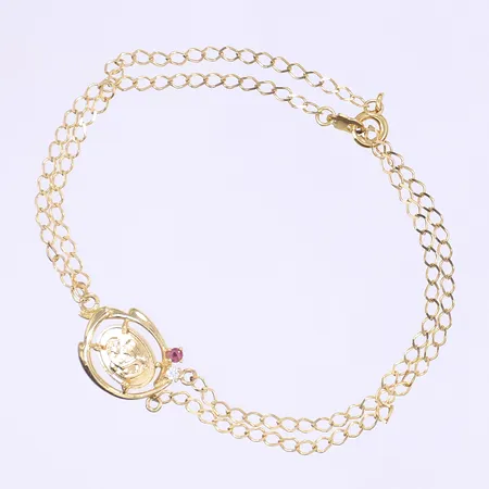 Armband med röd och vit sten, ca 19cm, bredd ca 2-13mm, 18K Vikt: 3,9 g