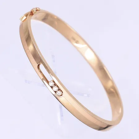Armring öppningsbar med tre vita stenar  Ø61mm, bredd 6mm, roséguld, 18K  Vikt: 13,6 g