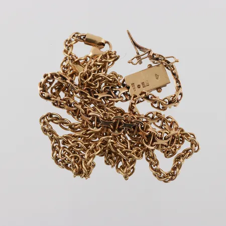 Trasigt guld 18k. Vikt: 42,7 g