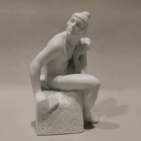 Figurin Royal Copenhagen Sagaittarius Pia Langelund, höjd 25cm, bredd 15cm, porslin, visst ytslitage Skickas med postpaket.