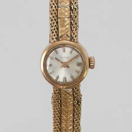 Damur Cyma 18K, 17mm, manuell, skadad länk i 18K, skadad urtavla, bruttovikt 28,4g.