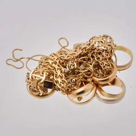Diverse defekt guld 18K, vikt 120,54g.