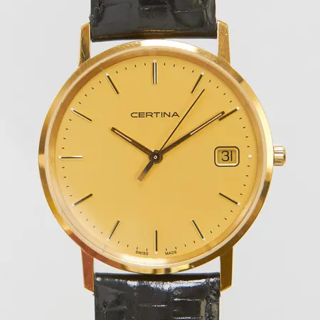 Herrur Certina 18K quartz 33,5mm, boettnr EOL158928968, datum, mineralglas, svart läderarmband, behov av batteribyte, gravyr, inga tillbehör, bruttovikt: 30,6g.