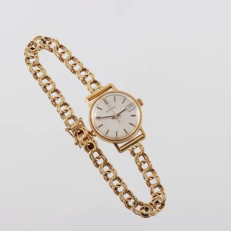 Damur Eterna 18k i ur och band,gravyr,diameter 21.9 mm,totalvikt 21.3 gram.