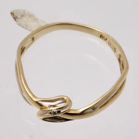 Defekt guld, 18K, vikt 1,23g.