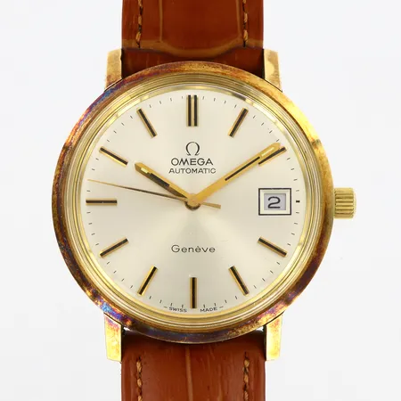 Herrur Omega Geneve Ø35mm automatisk, plastglas datumfönster, guld på stål, läderband, etui