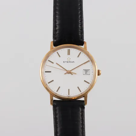 Herrur 18k Eterna,fungerar ej,gravyr,diameter ca 33.5 mm. Vikt: 0 g