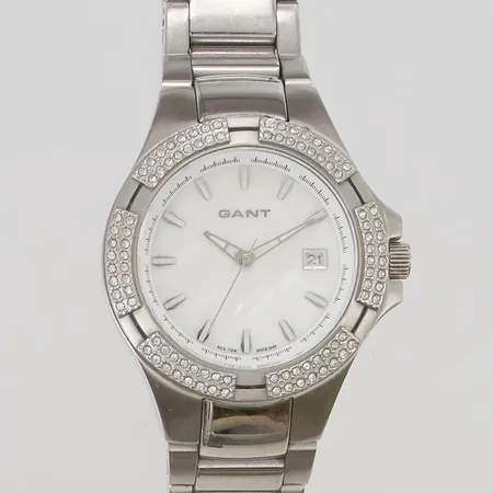 Damur Gant 39mm stål quartz, batteribyte krävs, går ej, pärlemortavla, vita stenar, länk ca 17,5cm, etui. Skickas med paket.