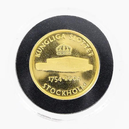 Mynt, Kungliga slottet Stockholm 1754-2004, Sverige, Ø 22mm, djup: 2mm, myntkapsel, 18K. Vikt: 8,7 g