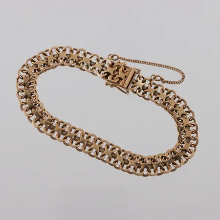 Armband 18k X-länk,bruksslitage,längd ca 18.5 cm,bredd 8.8 mm. Vikt: 19,4 g