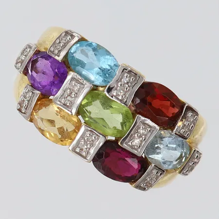 Ring med Ametist, Citrin, Topas, Granat, Peridot, Rhodolit, Diamanter 20 x 0,0075ct, stl:17½, bredd 1,8-11mm, GHA, 18K.   Vikt: 5,3 g
