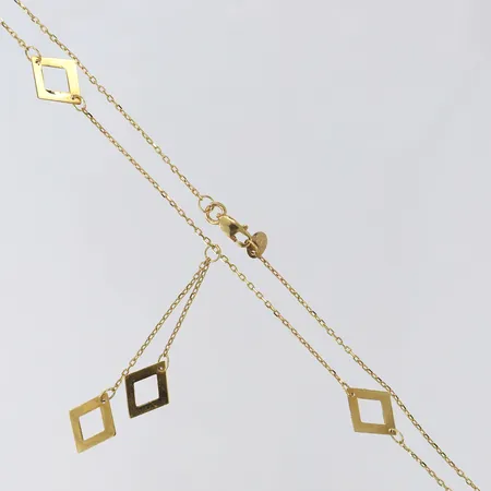 Collier med integrerad dekor, längd 43cm, bredd 0,7-9mm, 18K.  Vikt: 3,5 g