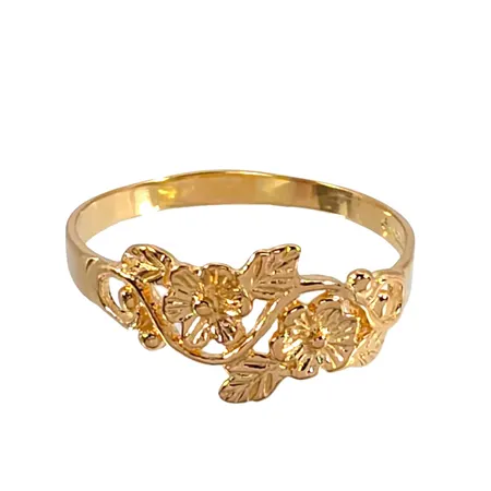 Ring i 18K guld, blomdekor, Bronsil AB (SGP), svensk kontrollstämpel, stl:19,0 mm, bredd 2,3 - 9 mm, fint skick Vikt: 2 g