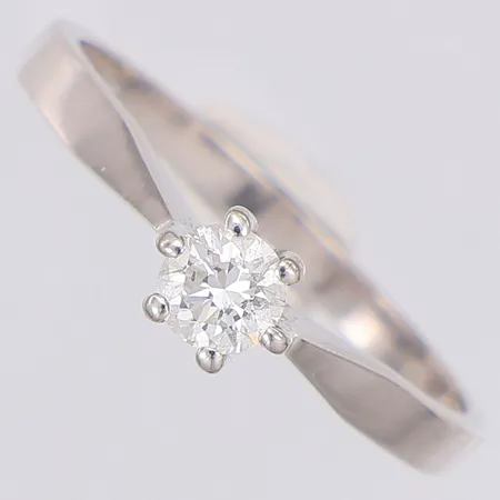 Stjärnring Bellatrix diamant 0,25ct TW(F)P1 enligt certifikat från AB Fritz Olsson 1977, stl:17, vitguld, 18K Vikt: 2,1 g