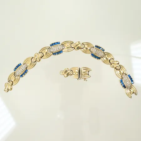 Armband med blå och vita stenar, gått av i länk, 14K, 24,9g bruttovikt