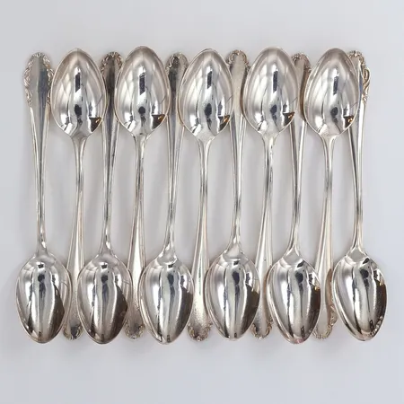 Elva skedar, längd 11cm, Silver 830/1000.  Vikt: 113,9 g