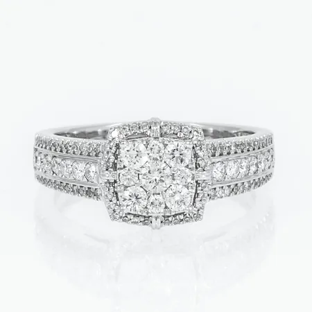 Ring Guldfynd med 99 diamanter totalt 0,77ct stl:18½, bredd 3-10mm, gravyr, vitguld 18K 6,6g.