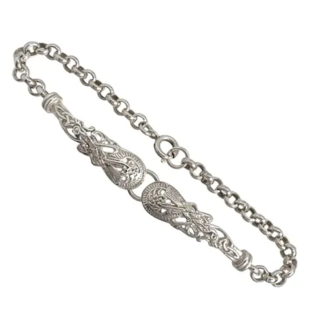 Armband silver med integrerad dekor, längd 19 cm, bredd 4,5-9 mm, oidentifierad utrikisk tillverkarstämpel T.J.H, fint skick Vikt: 11,5 g