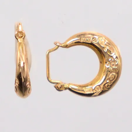 Ett par örhängen, längd 1,5cm, 18K. Vikt: 1,2 g