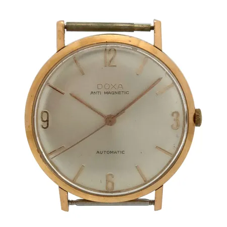 Herrur Doxa, 14K guld, Ø34 mm, automat, bruksmärken, slitage krona,  Vikt: 27 g