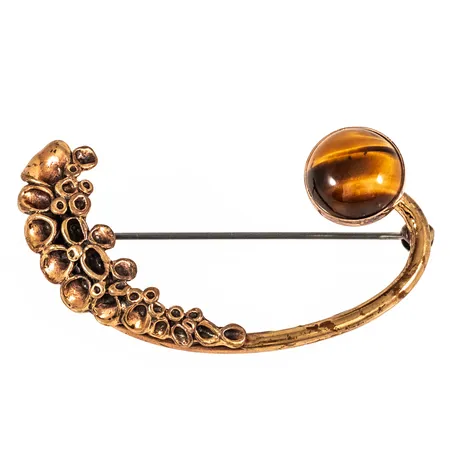 Brosch Hannu Ikonen Finland med tigeröga, 55 x 32mm, brons 12,6g. 