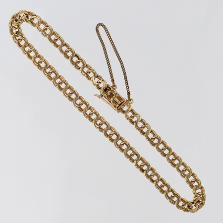 Armband Bismarck, säkerhetskedja, längd ca 19cm, bredd 4,5mm, 18K.  Vikt: 7,1 g