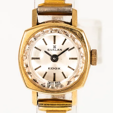 Damur Svalan Edox i 18K guld med band i metall, manuell, 16,5mm, plastglas, krona fungerar inte som den ska, servicebehov. Vikt: 0 g