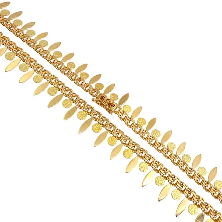 Collier i 18K guld, delvis matterad dekor, stämplad CG, längd knäppt 42,5 cm, bredd 11 mm, fint skick Vikt: 24 g