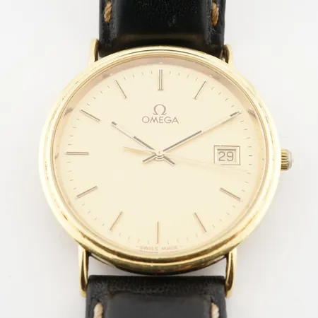 Herrur Omega, quartz, 32,5mm, 18k, batteribyte krävs, gravyr bakboett