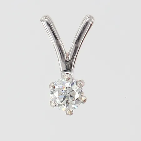 Hänge med diamant 1 x ca 0,30ct, Kvalité ca W-TCr(H-I)/SI1,13,5x4,5mm, vitguld 18K.  Vikt: 0,9 g