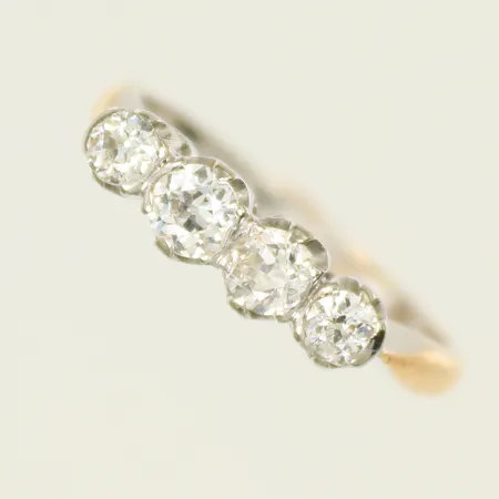 Ring tvåfärgad med 4 gammalslipade diamanter 2 x ca 0,15ct och 2 x ca 0,10ct stl ca 17½, bredd 1,5-4mm, 18K, 3g  