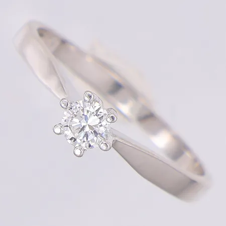 Stjärnring Bellatrix diamant 0,18ct TW(G)P1 enligt certifikat från AB Fritz Olsson 1980, stl:17¼, vitguld, 18K Vikt: 2 g