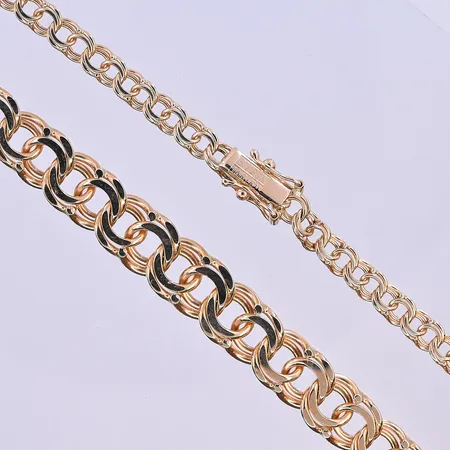 Collier doserad Bismarck längd 45 cm, bredd 4-9 mm 18K. Vikt: 28,2 g