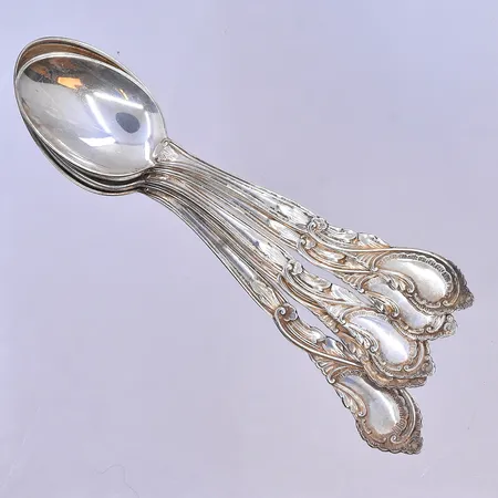 5 skedar Rococo längd 11-12,5 cm, silver 830/1000. Vikt: 72,9 g