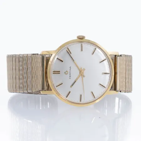 Herrur Certina 18K manuell 34mm, defekt flexband i metall, repigt plexiglas. Vikt: 0 g