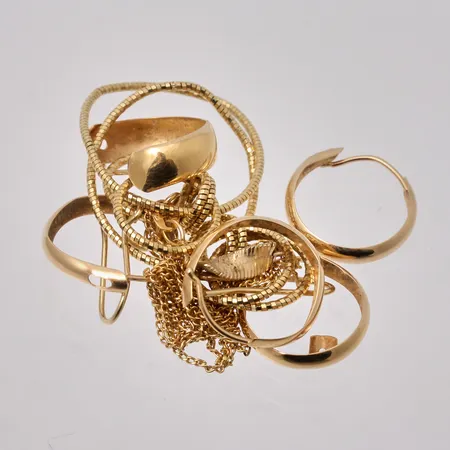 Diverse defekt guld, 18K, 7,28g.