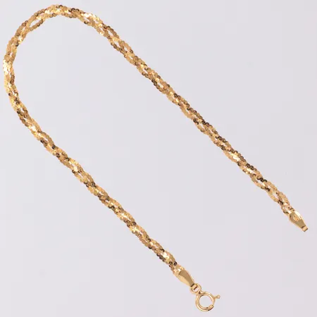 Armband flätad modell längd 18,5cm, bredd 2,9mm, 18K Vikt: 2,3 g