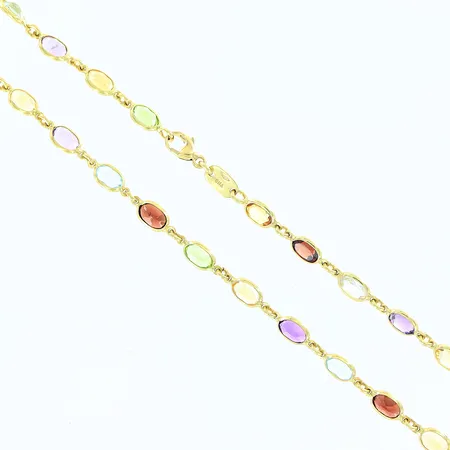 Collier Hallbergs guld ametist/citrin/blå topas/granat/peridot längd 43cm bredd 4mm nypris: 31 995kr 18K. Vikt: 10,2 g