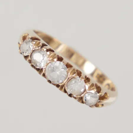 Ring med vita stenar, naggade, stl 19, 18K Vikt: 4,4 g