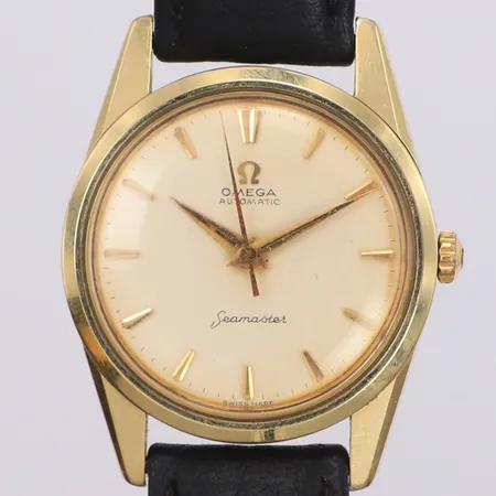 Herrur Omega Seamaster guld på stål automatisk 33,6mm, Cal. 552, verknr 18212260, boettnr 14700 4 SC, repigt glas, läderband samt bygelspänne ej original, inga tillbehör.