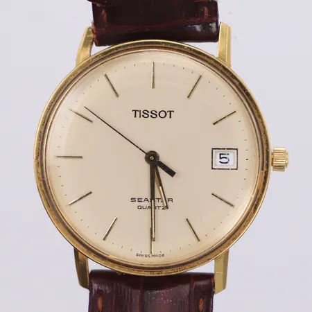 Herrur Tissot Seastar 18K quartz (går ej) 33,5mm, datum, plexiglas, gravyr, defekt krona, defekt läderband, inga tillbehör 