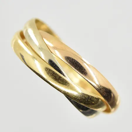 Ring tredelad i gulguld rödguld vitguld stl:16, bredd 5 mm, obs ej märkesdesign, 18K. Vikt: 2,6 g