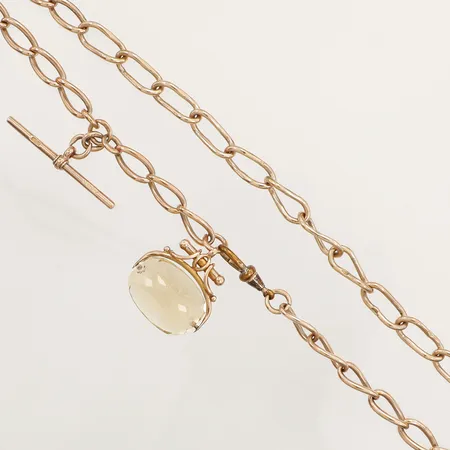 Fob med citrin, längd 46cm, bredd 7,3mm, nagg på sten, 9K  Vikt: 52,6 g