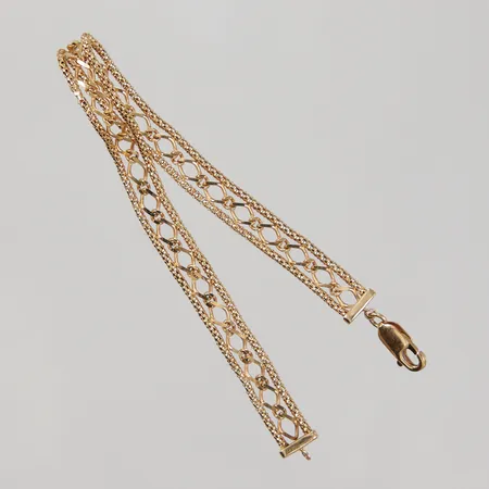 Armband 18,5cm, bredd 7mm, mindre ojämnheter 18K Vikt: 7,3 g