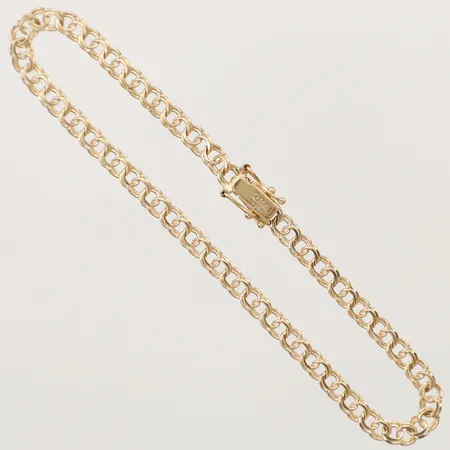 Armband Bismarck Guldfynd längd 19cm, bredd 3,7mm, 18K Vikt: 5 g