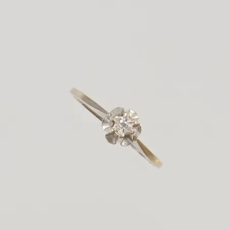 Ring diamant ca 0,01ct stl:15¾ bredd 5mm 18K 1,0g.